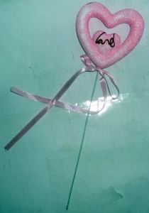 Фотография Сердце с лентой на палочке розовое 8x25см