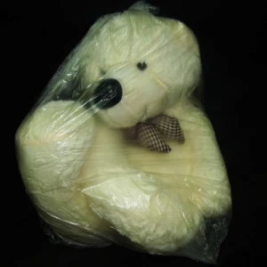 Фотография Медведь шарф в клеточку