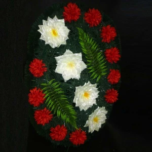 Фото Венок ритуальный лотосы астры листы 90см